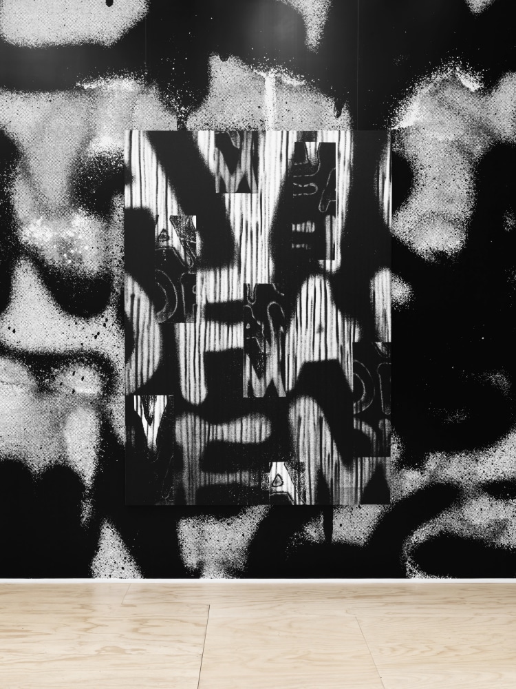 Installation view of Liam Gillick and Adam Pendleton films and wall-based works