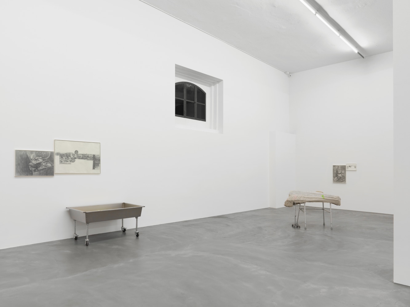 Installation view of paintings and sculptures group exhibition