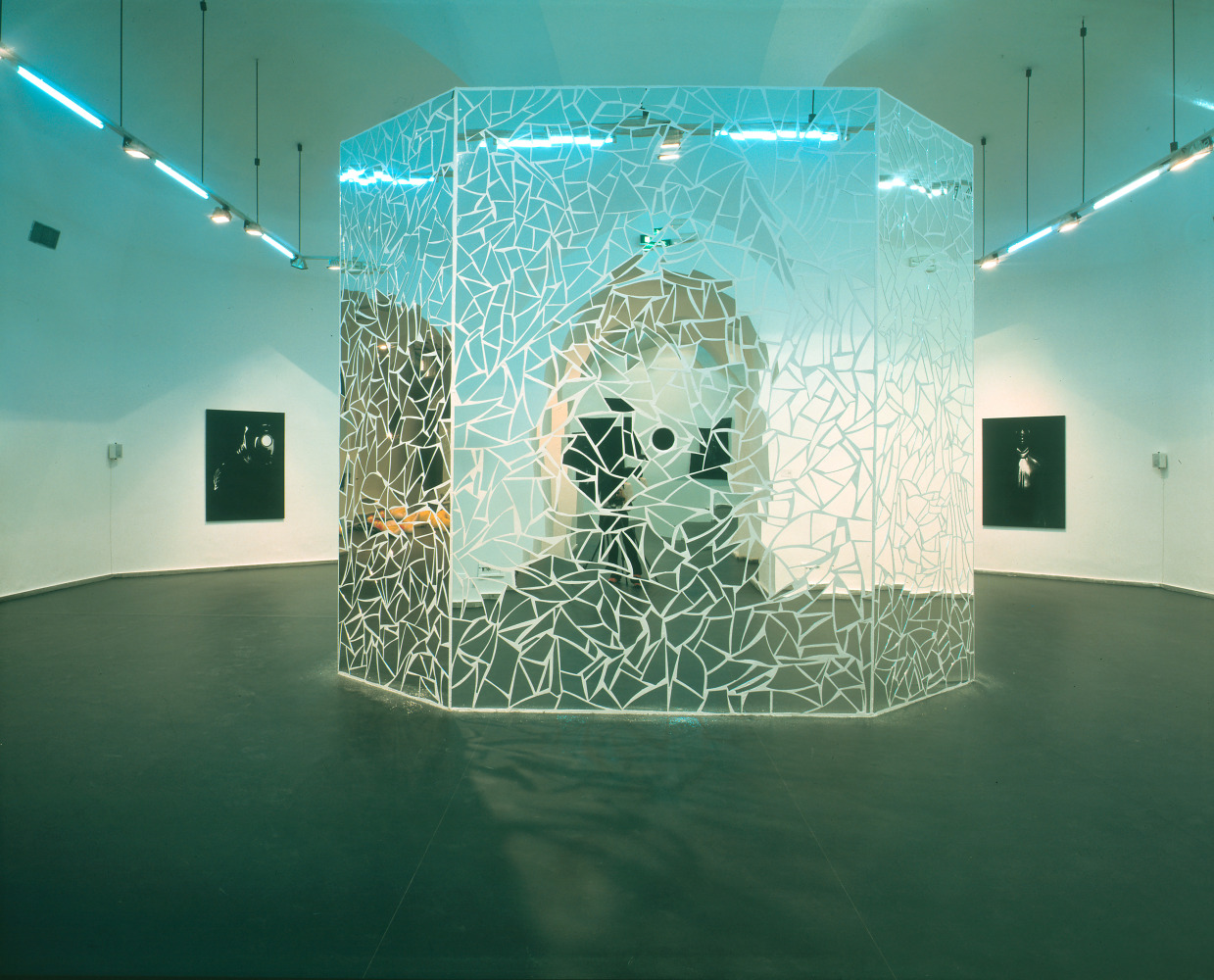 Installation view of sculptures and paintings by Ugo Rondinone