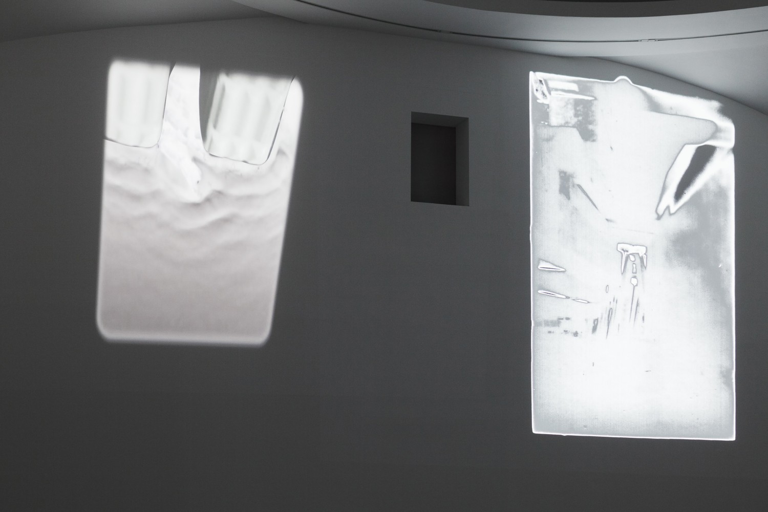 Installation view of videos by Trisha Donnelly