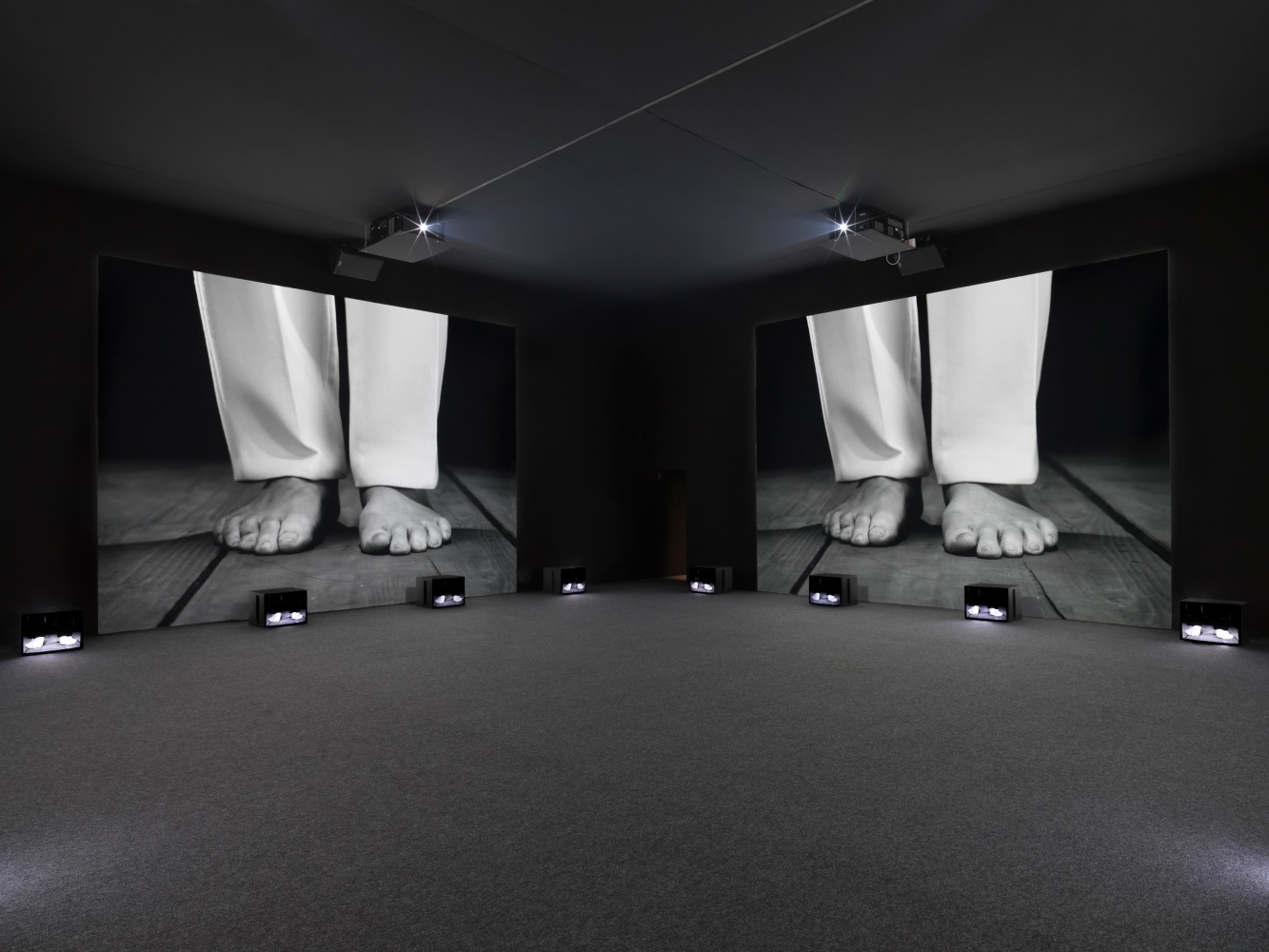 Installation view of Ugo Rondinone THANX 4 NOTHING 2015 Film installation Black &amp; white, stereo sound 2 X 4 films on video projections (films 2K, 4/3) 2 X 16 films on monitors (films HD, 4/3) 24:14 min