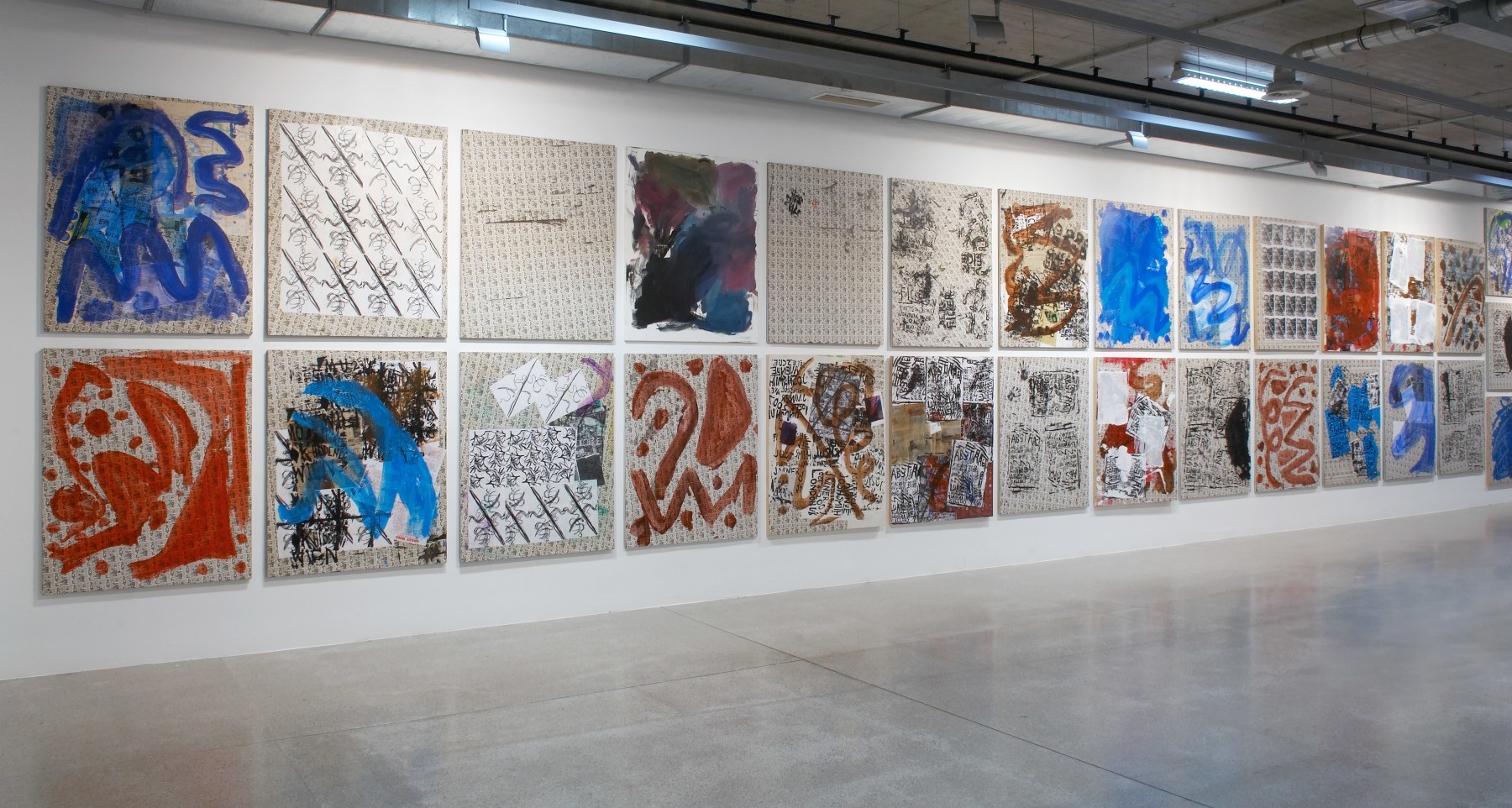 Installation view of paintings by Josh Smith