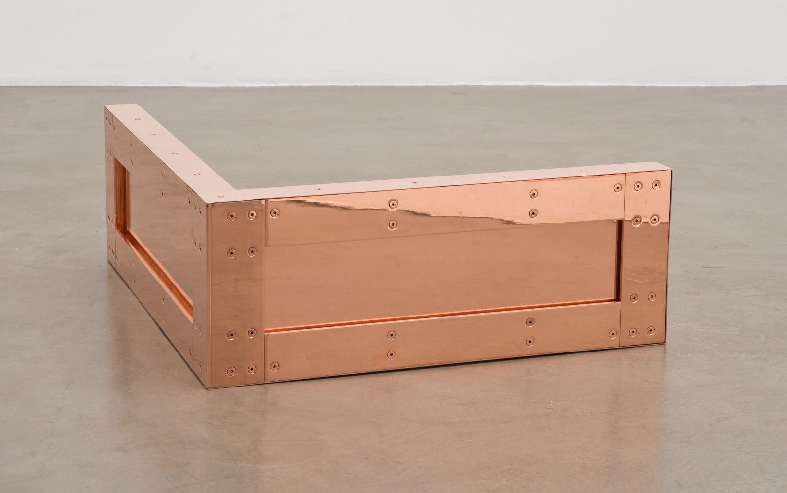 Walead Beshty Copper Surrogate (60&quot; x 120&quot; 48 ounce C11000 Copper Alloy, 90° Bend, 120&quot; Bisection/Section 10: June 1-8/August 30, 2016, Zurich, Switzerland; January 28/February 4, 2019, Geneva, Switzerland) 2016– Polished copper 29 x 76 x 76 cm / 11 1/2 x 30 x 30 in