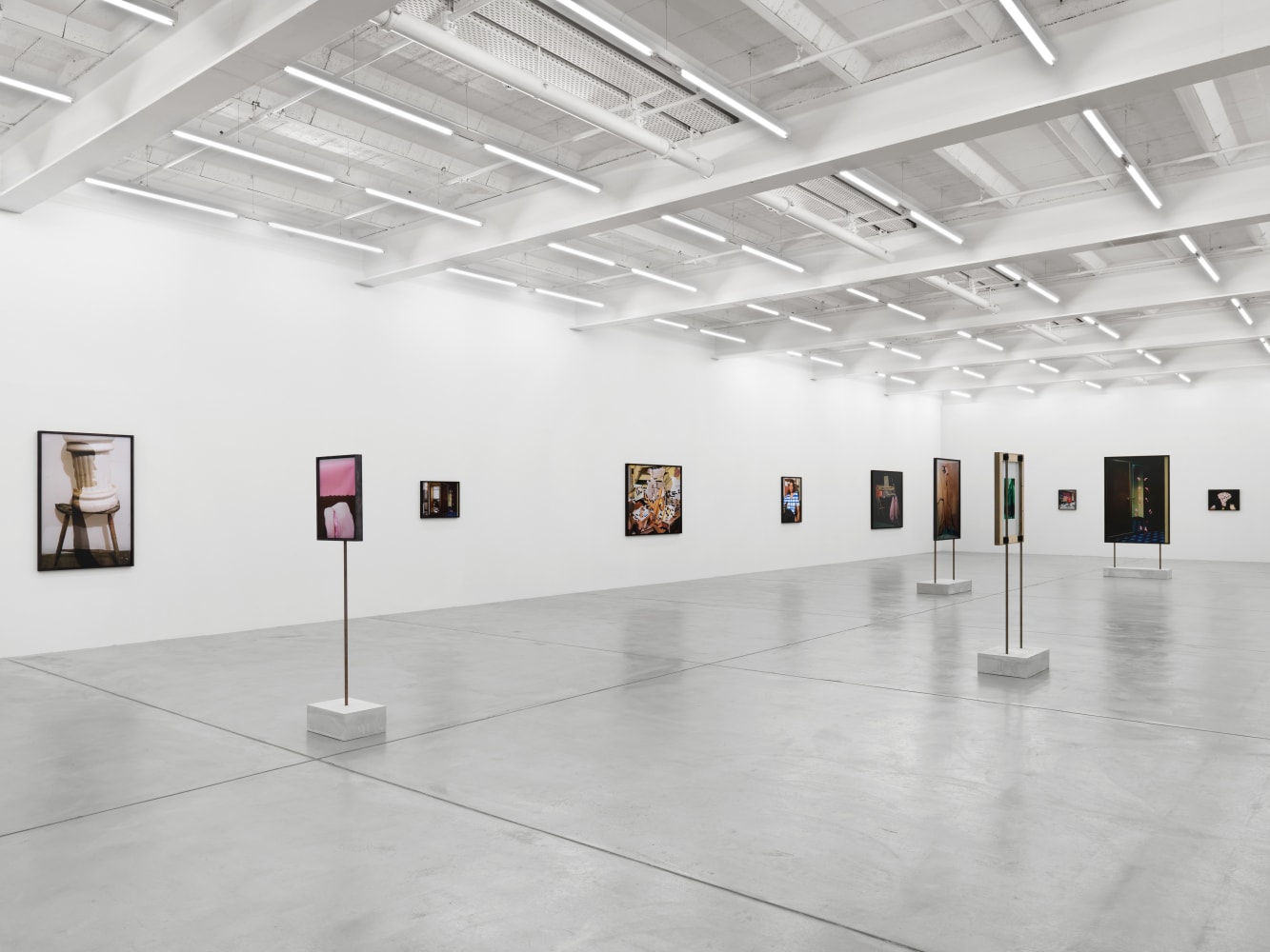 Installation view of Lucas Blalock photography and sculpture exhibition