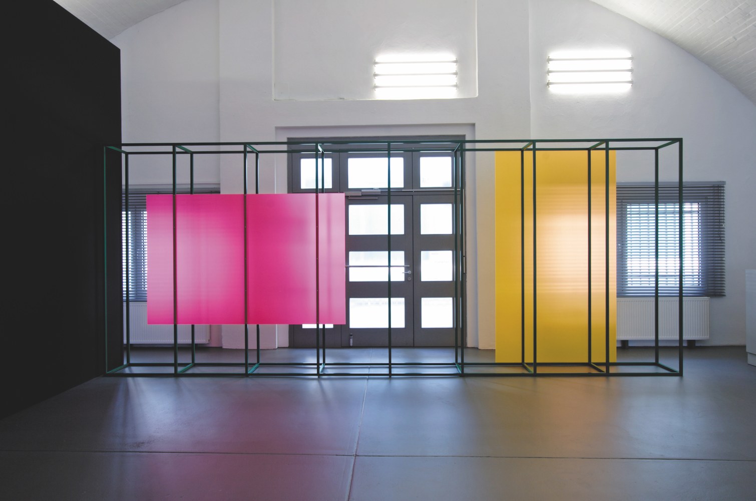 Installation by Gerwald Rockenschaub, I wish I was… 2005 Metal frame, 2 acrylic glass sheets, satined, screws, washers, wall paint 270 x 670 x 60 cm Installation view, Galerie Mehdi Chouakri, Berlin, 2005