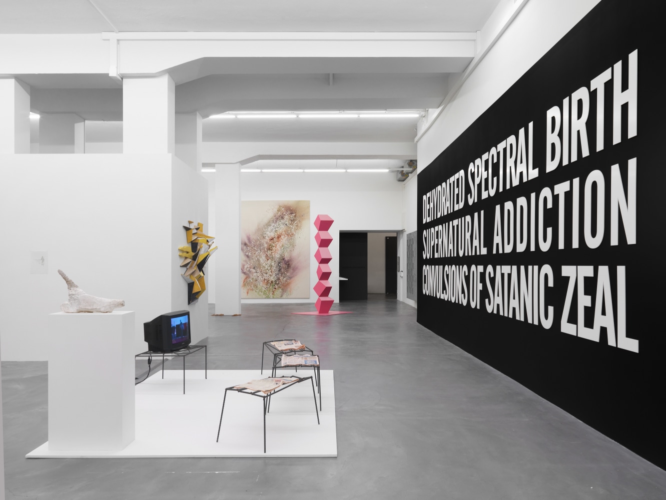 Installation view of paintings and sculptures group exhibition