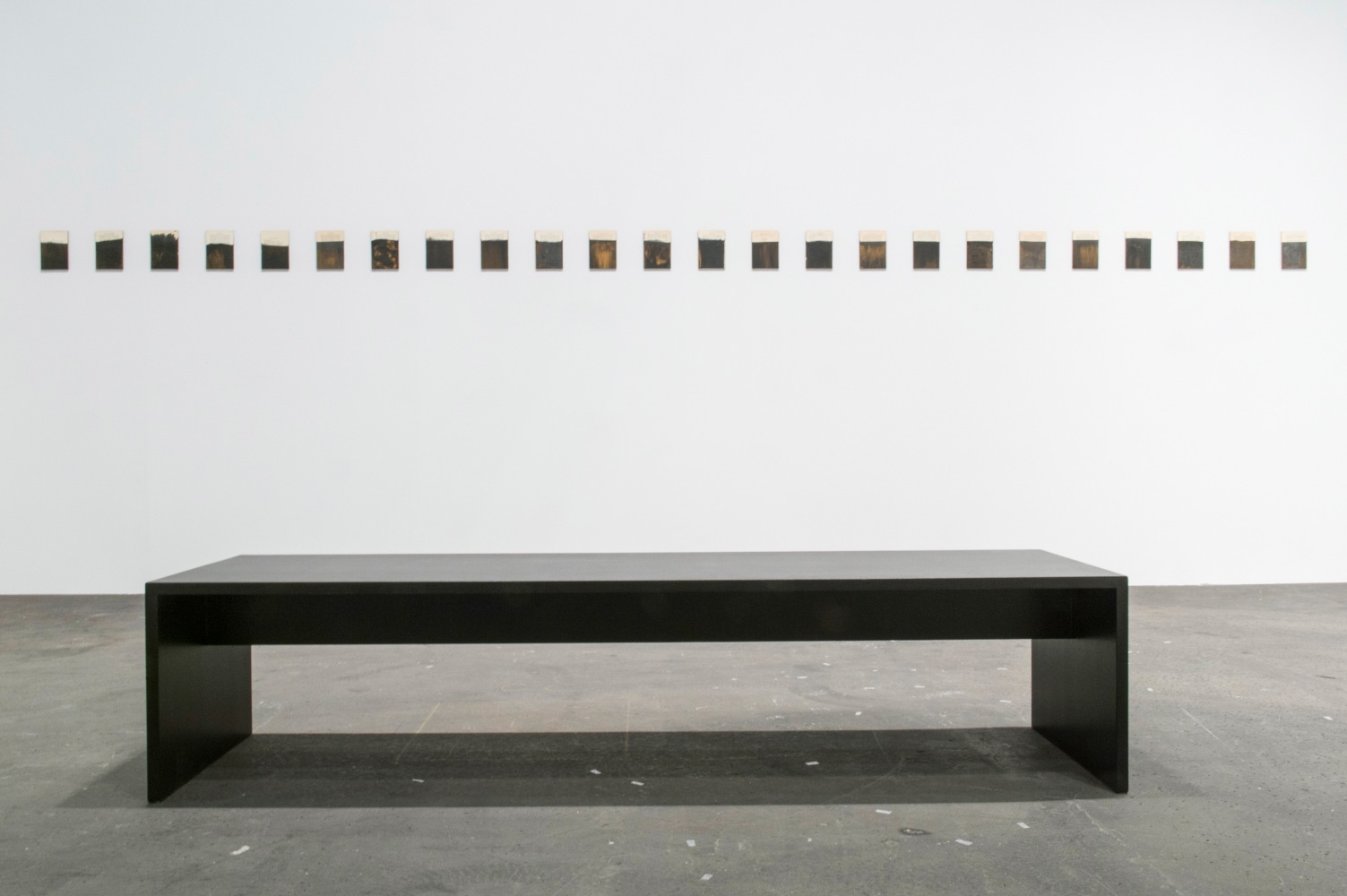 Installation view of paintings by Tim Rollins and K.O.S.