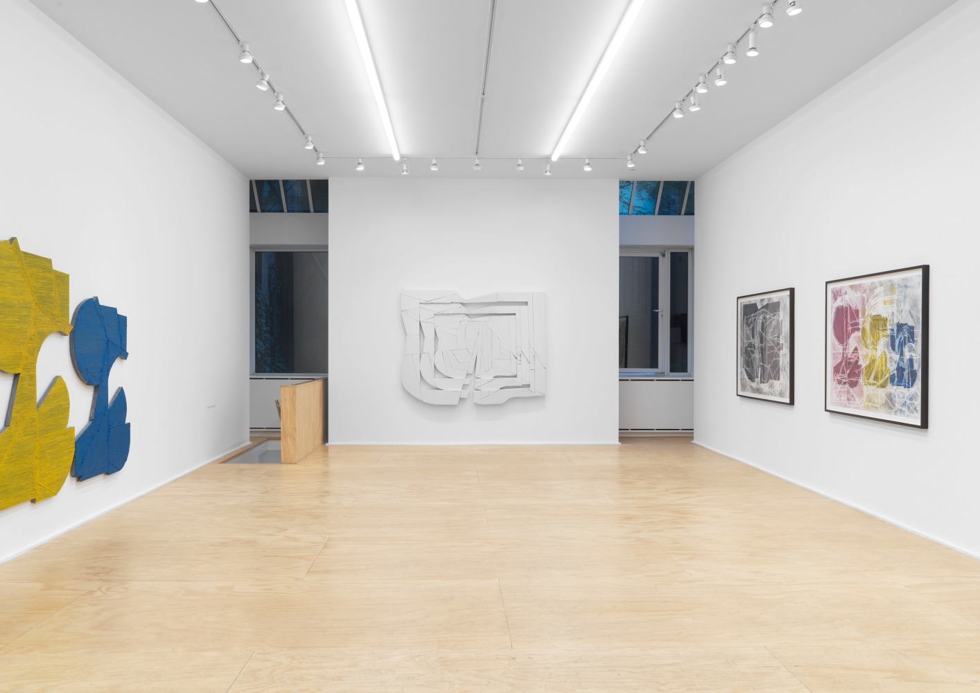 Installation view of Wyatt Kahn wall reliefs and works on paper