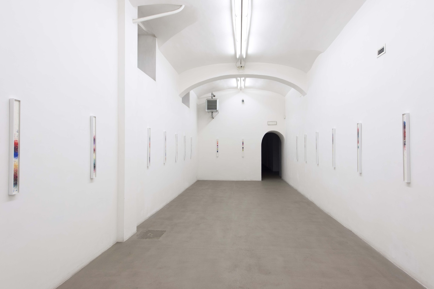 Installation view of sculptures and paintings by Sam Falls