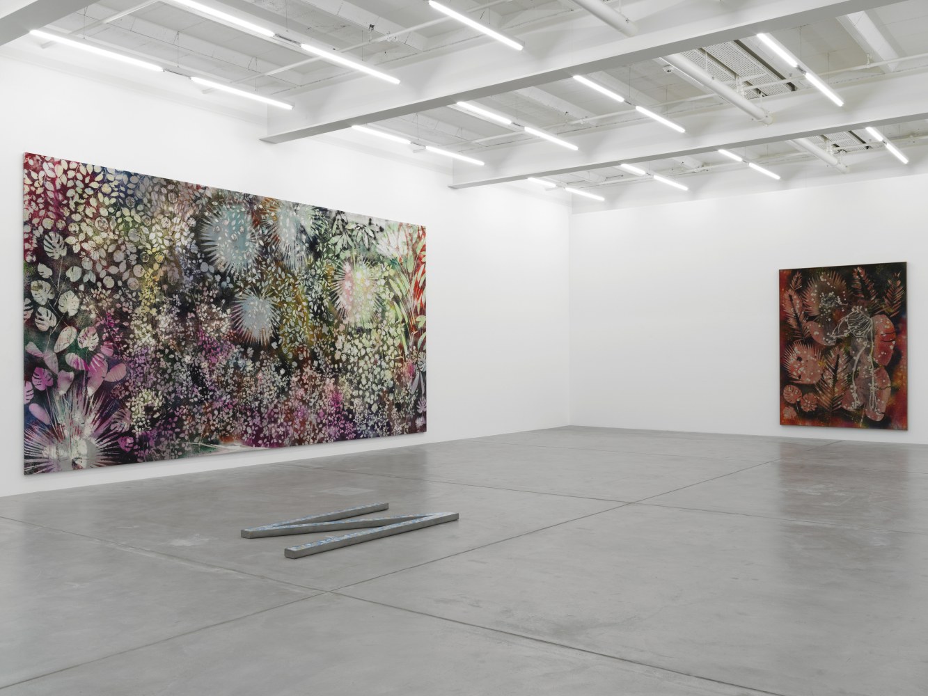 Installation view of Sam Falls paintings and sculptures exhibition