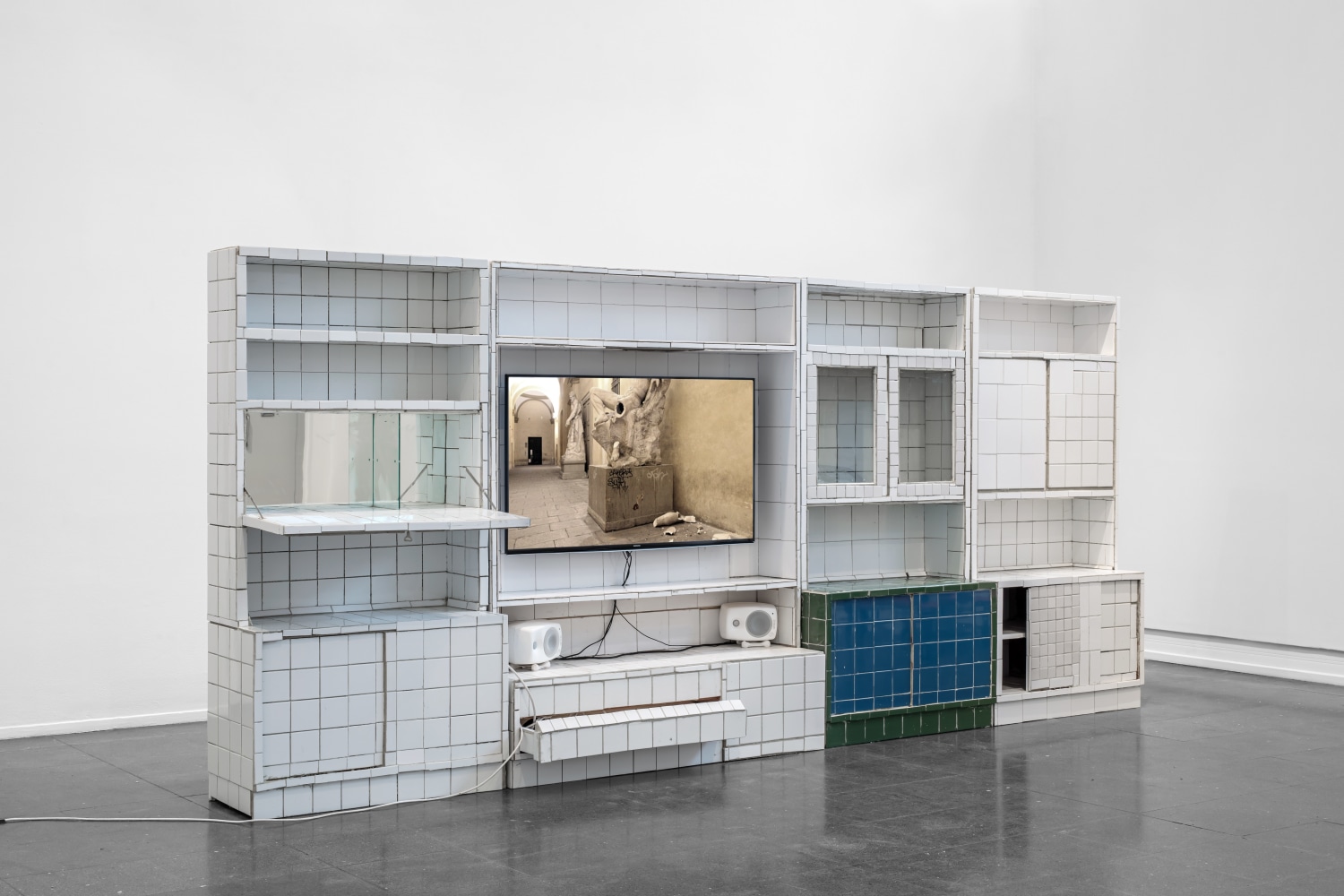 Indoor view of sculptural film installation by Matias Faldbakken