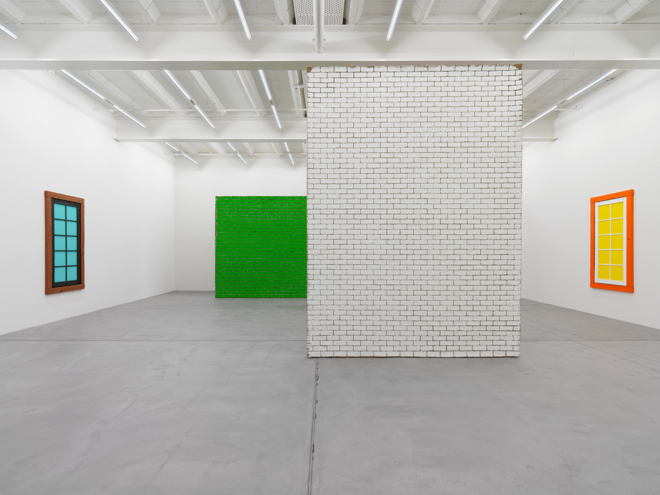 Installation view of Ugo Rondinone brick wall paintings exhibition