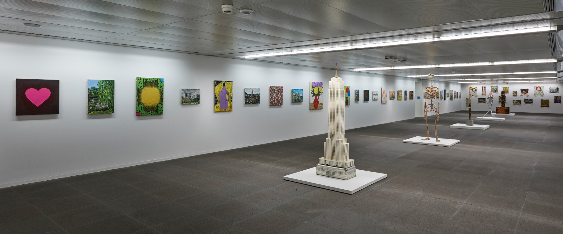 Installation view of paintings and sculptures by Jean-Frédéric Schnyder