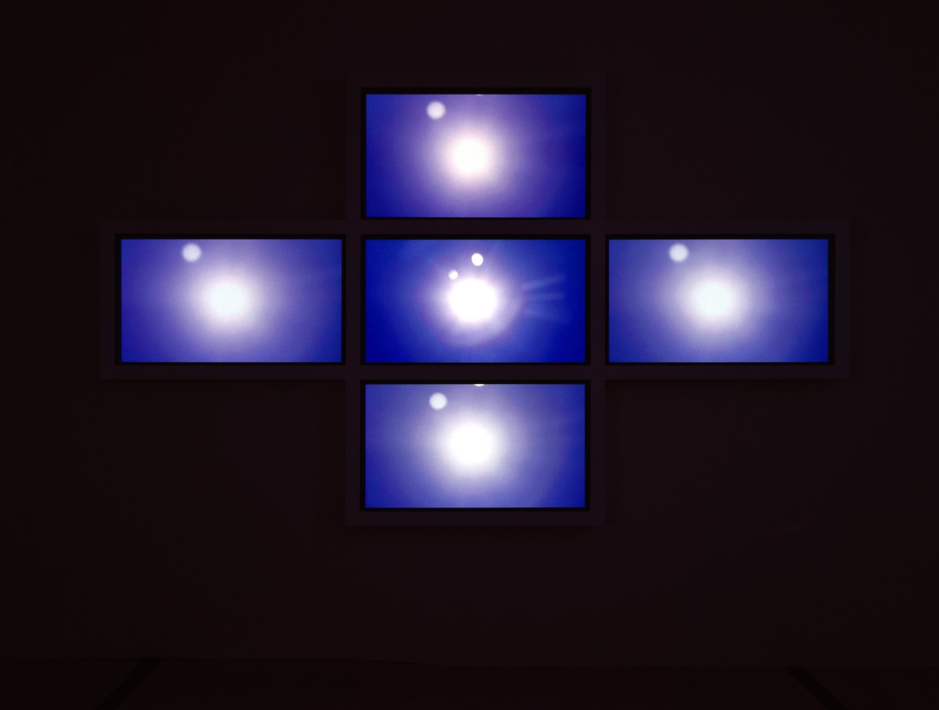 Installation view of Doug Aitken video exhibition