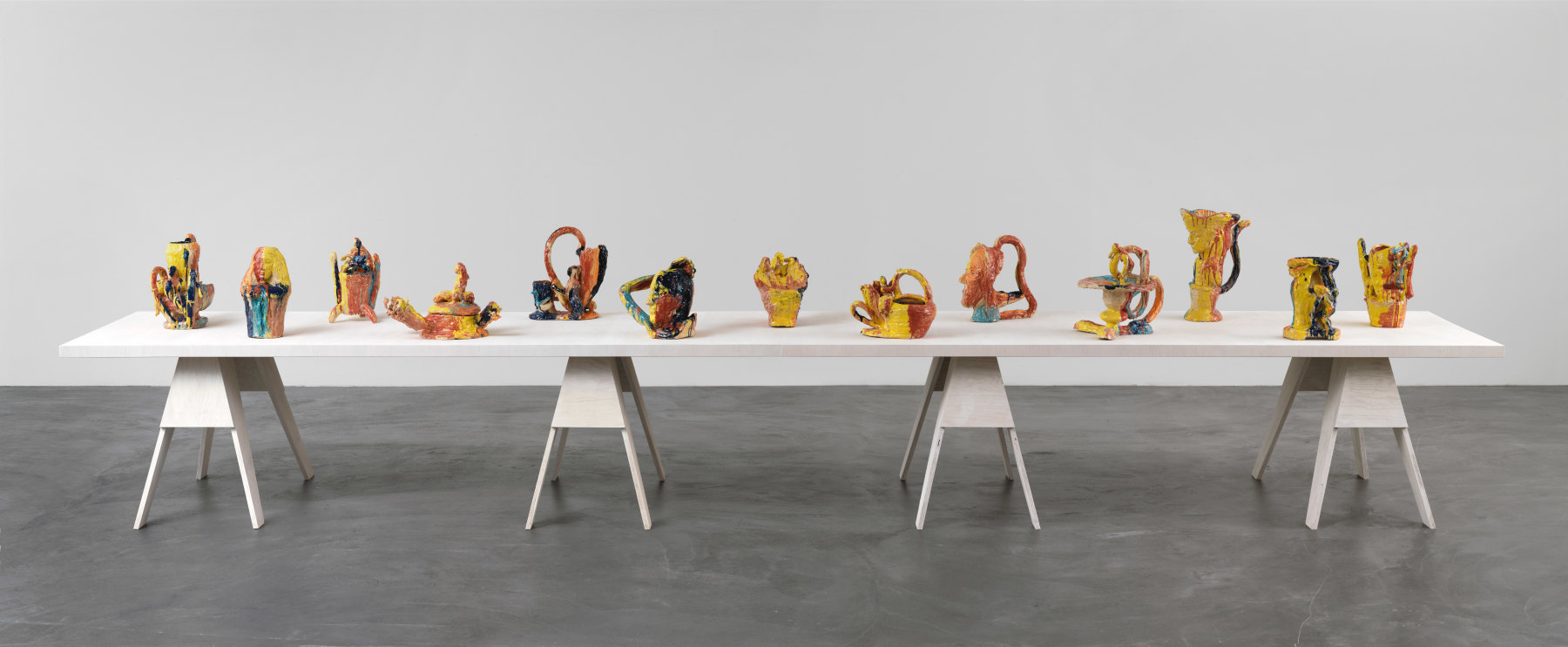 Group of sculptures by Andrew Lord on table