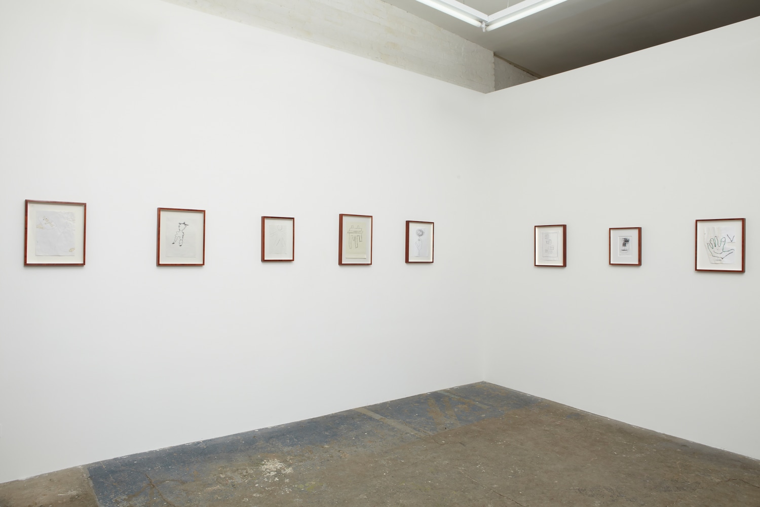 Installation view of drawings by Joe Bradley