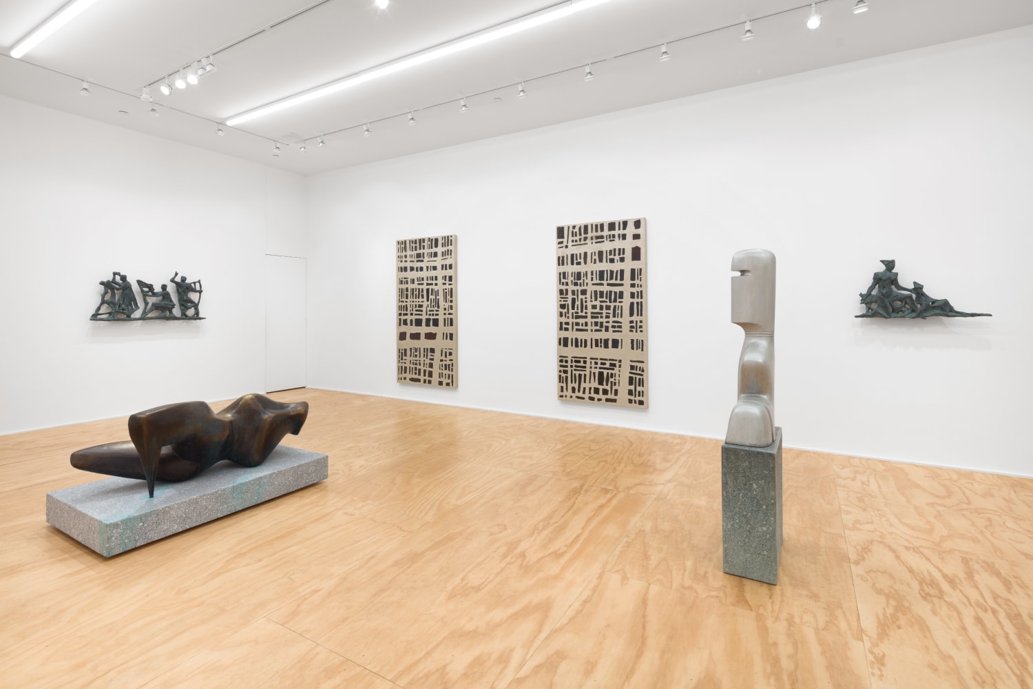 Installation view of sculptures and wall works by Valentin Carron