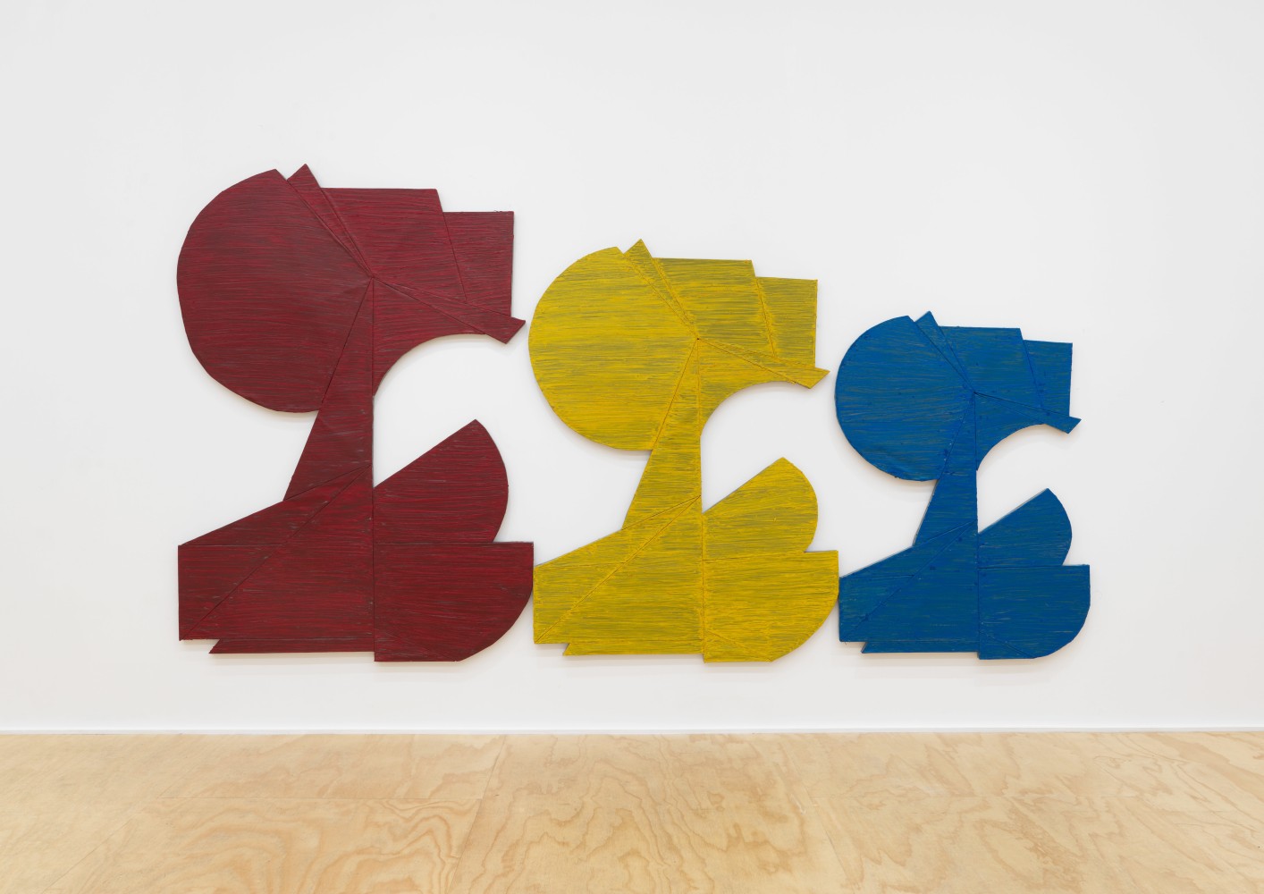 Installation view of Wyatt Kahn wall reliefs and works on paper