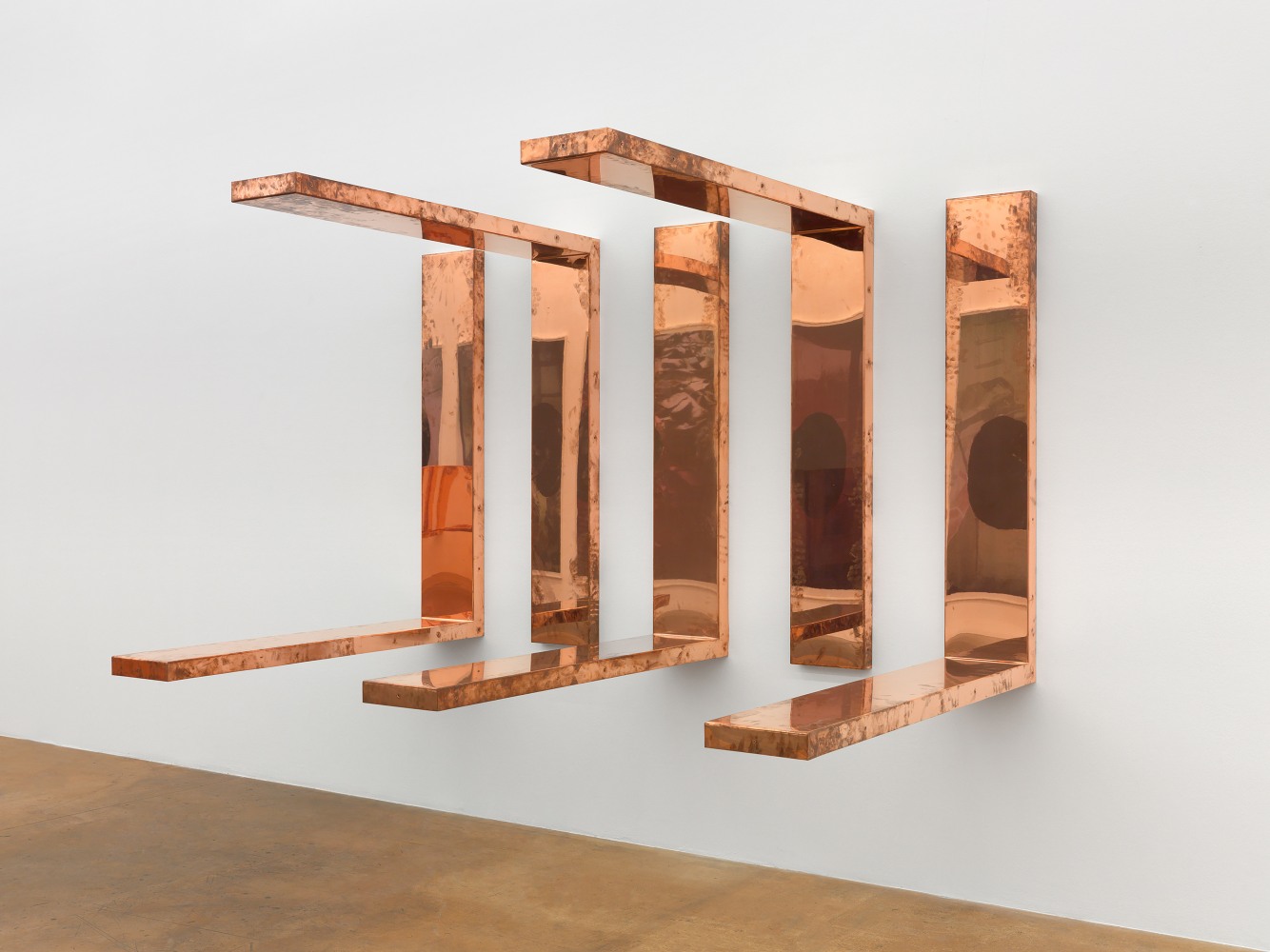 Installation view of a wall work by Walead Beshty