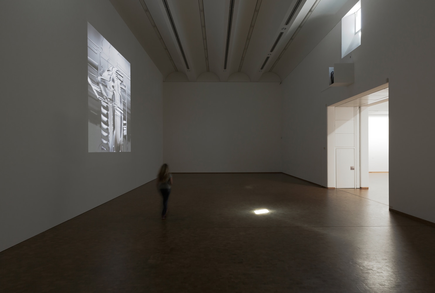 Installation view of videos and sculptures by Trisha Donnelly