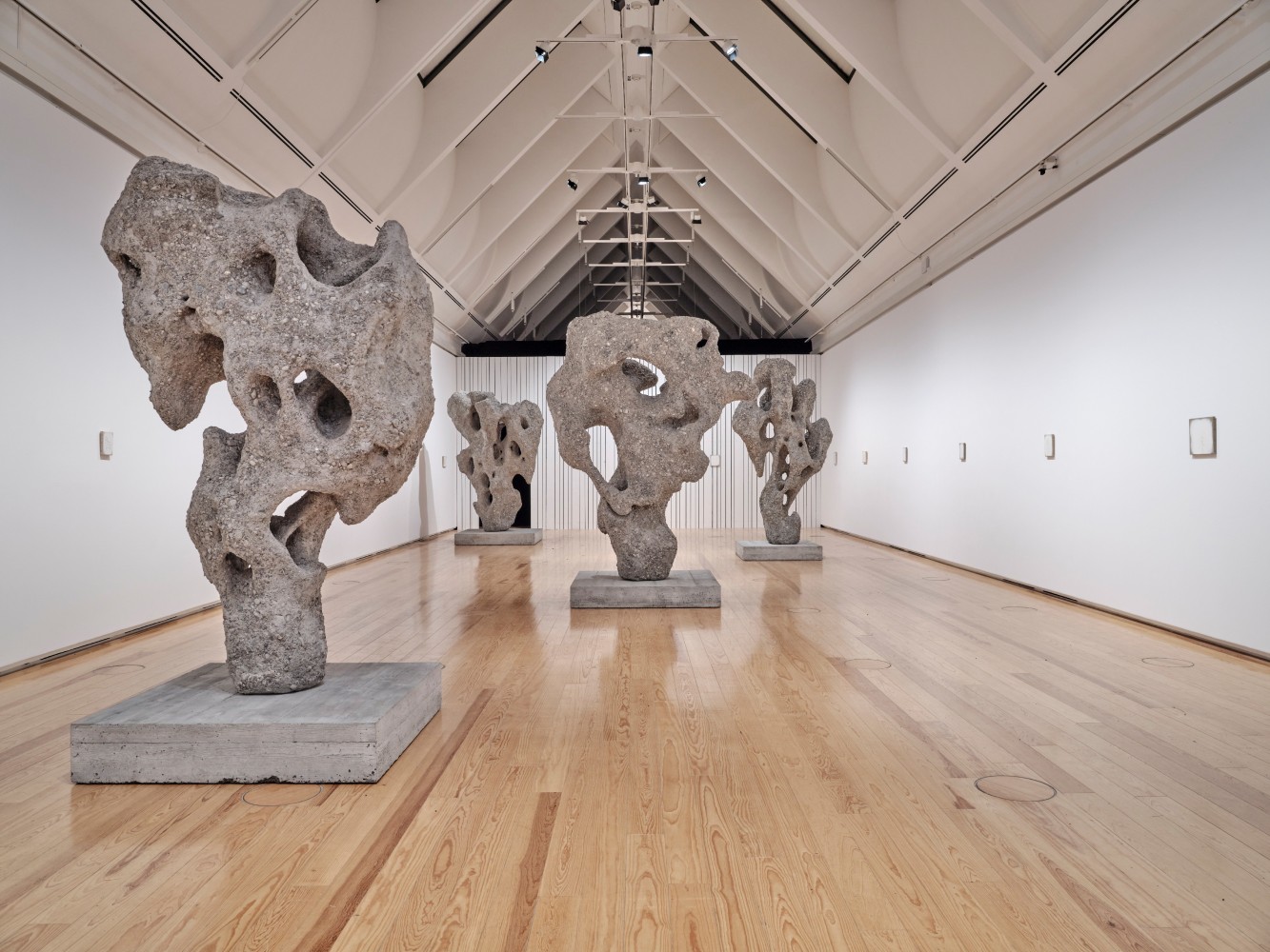 Installation view of paintings and sculptures by Ugo Rondinone