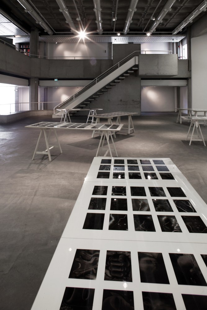 Installation view of photographs by Peter Fischli and David Weiss