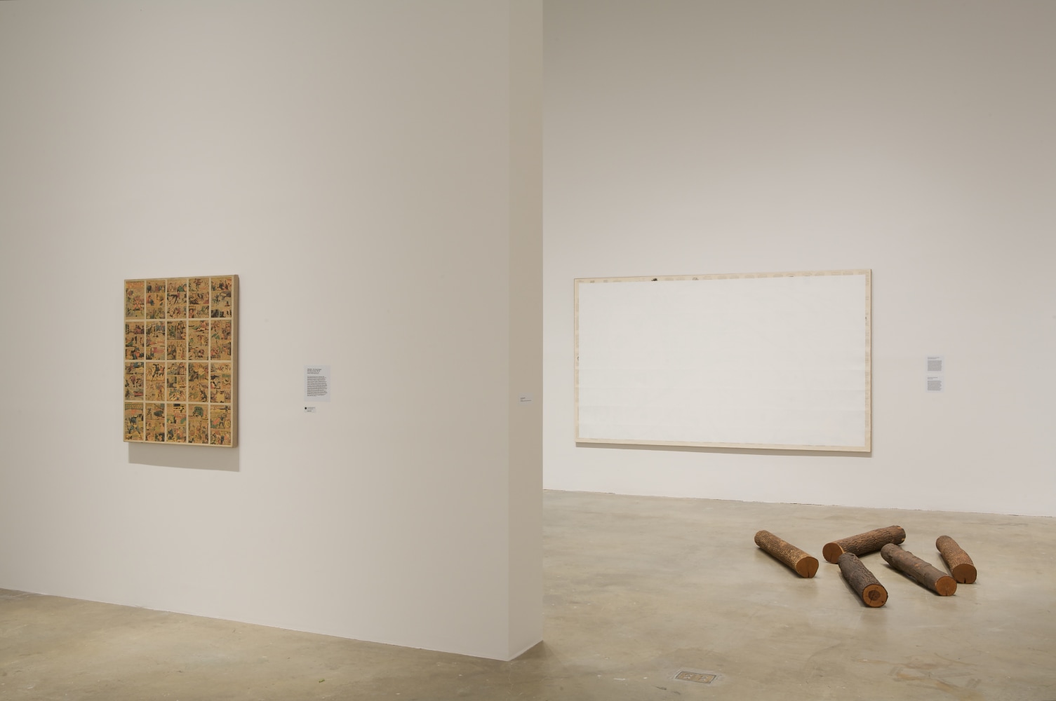 Installation view of paintings by Tim Rollins and K.O.S.