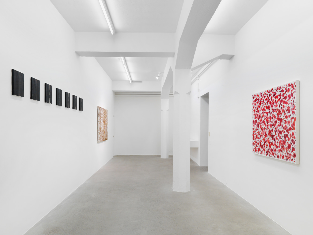 Installation view of Tim Rollins and K.O.S. paintings and text works exhibition