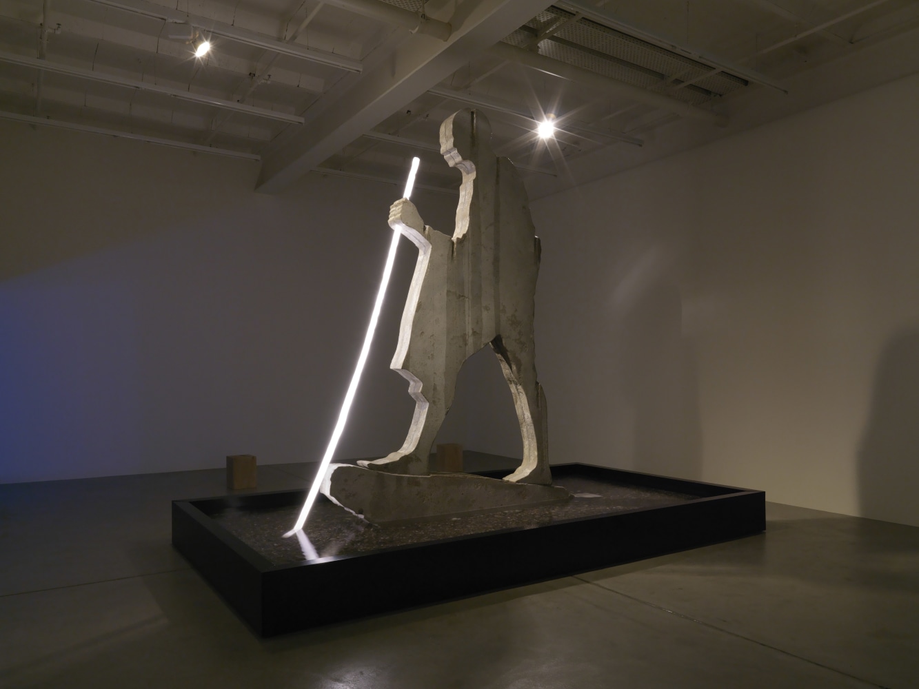 Sculptural installation by Doug Aitken, Crossing the Border 2018 Choreographed light sculpture and synchronized water fountain, steel, wood, fiberglass, stone, concrete 3.71 x 3.39 x 4.57 m / 12.17 x 11.12 x 14.99 feet