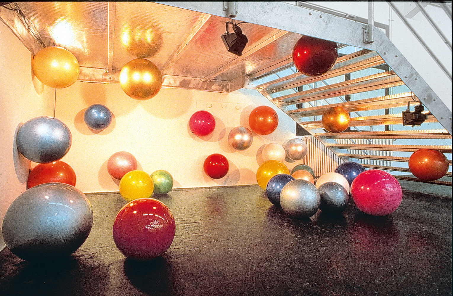 Installation view of paintings and sculptures by Ugo Rondinone