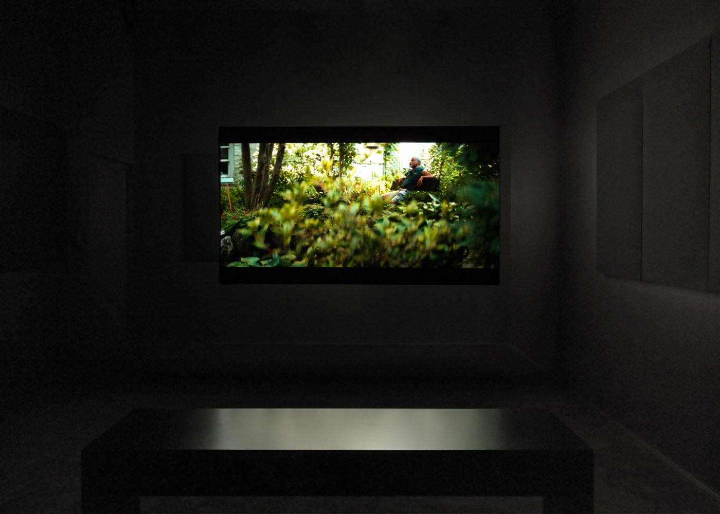 Installation view of Liam Gillick and Adam Pendleton films and wall-based works