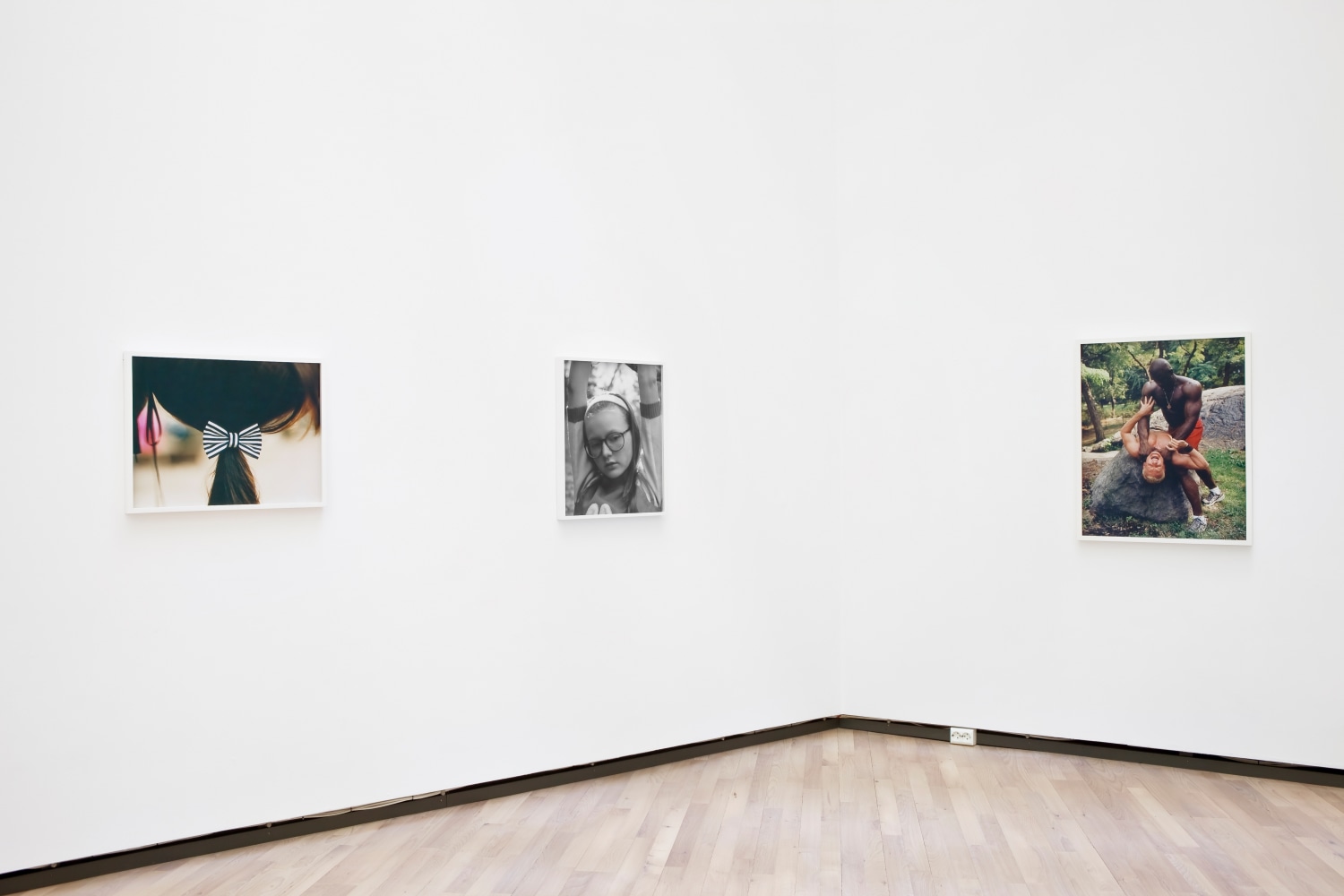 Installation view of photographs by Torbjørn Rødland