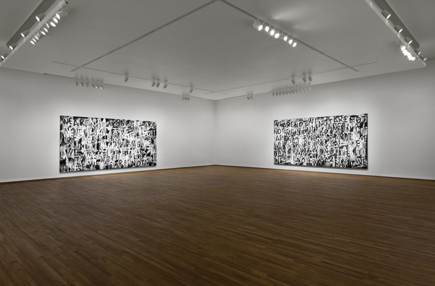 Installation view of black and white paintings by Adam Pendleton