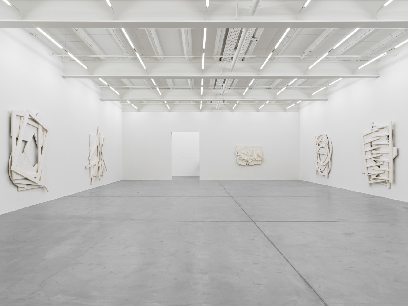 Installation view of Wyatt Kahn wall reliefs