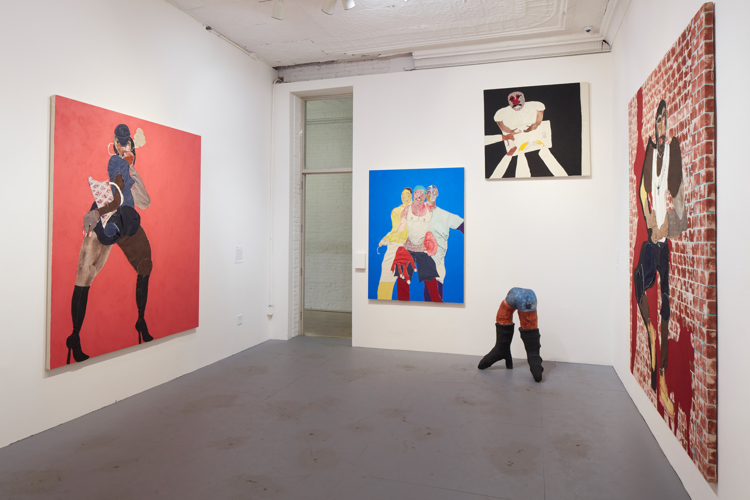 Installation view of paintings and sculptures by Tschabalala Self