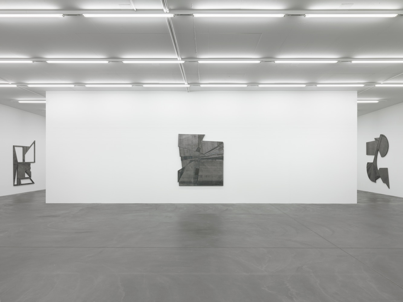 Installation view of Wyatt Kahn wall reliefs and photographs