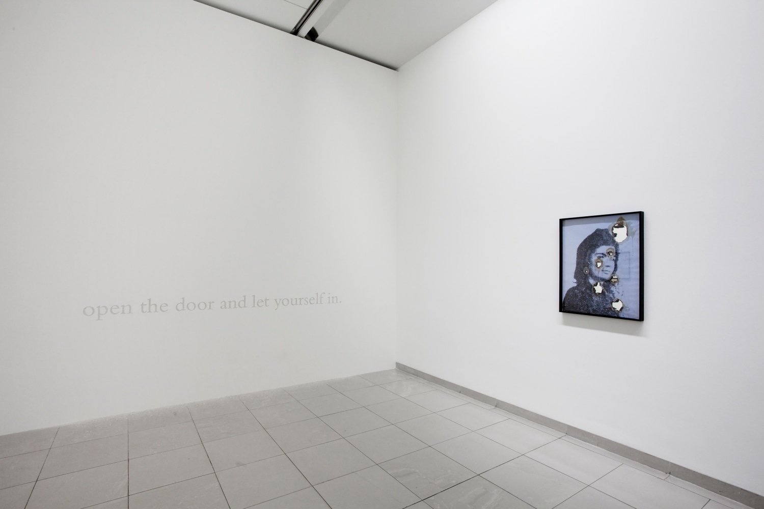 Installation view of photographs by Douglas Gordon