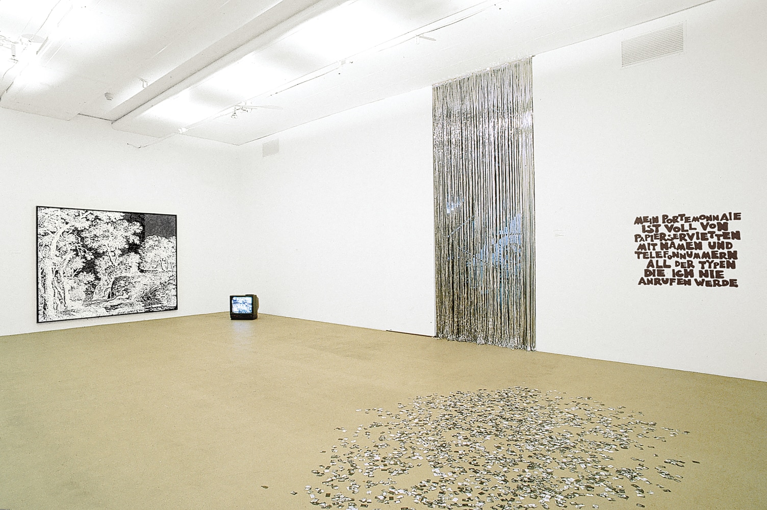 Installation view of sculptures and paintings by Ugo Rondinone