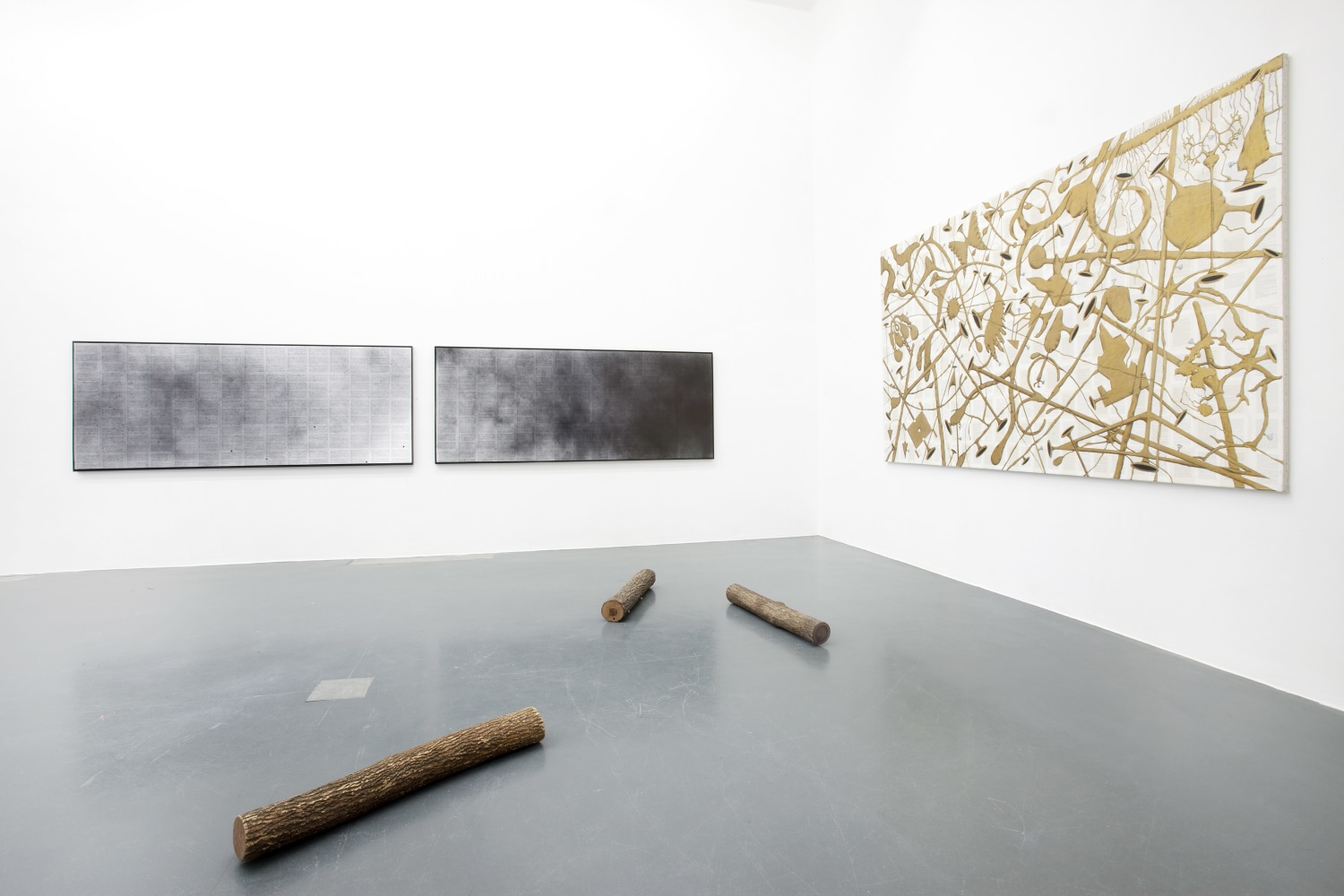 Installation view of paintings by Tim Rollins and K.O.S.