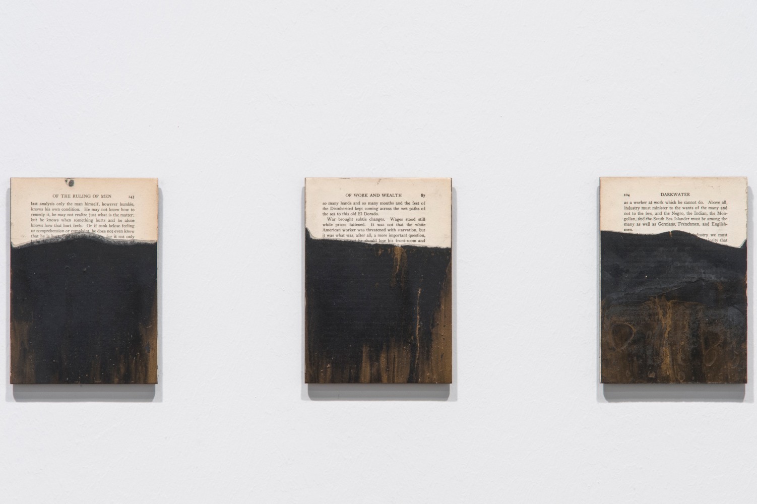 Installation view of paintings by Tim Rollins and K.O.S.