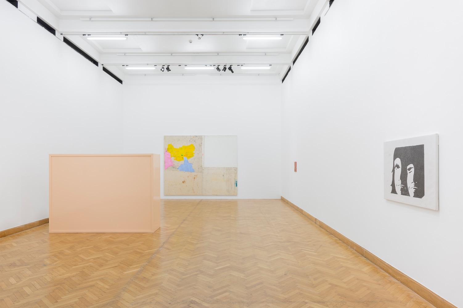 Installation view of paintings and sculptures by Joe Bradley