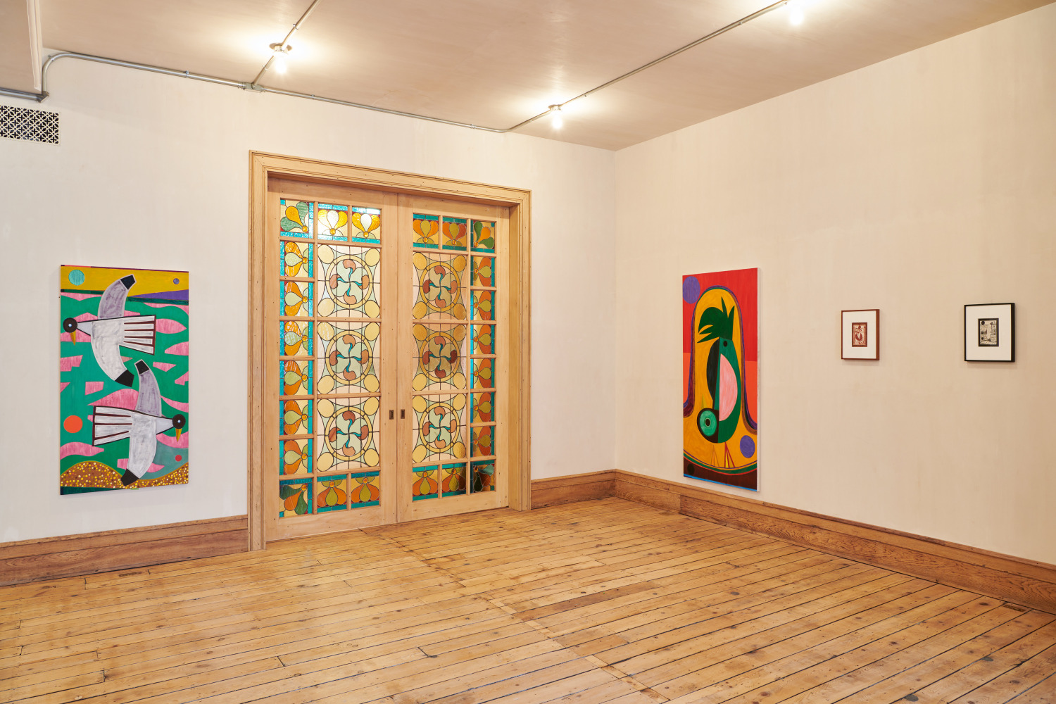 Installation view of paintings and drawings by Austin Eddy