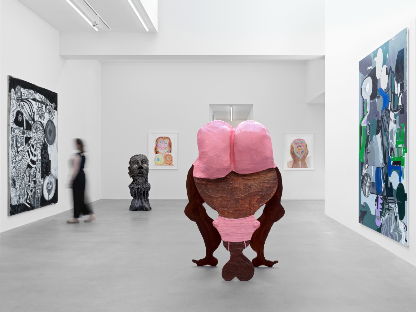 Installation view of group painting, print, and sculpture exhibition