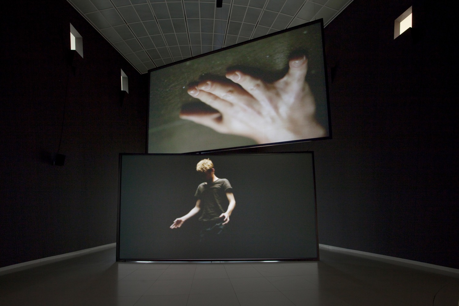 Installation view of video work by Douglas Gordon