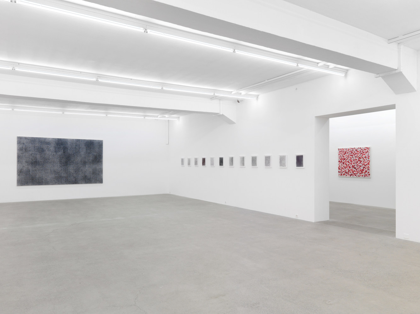 Installation view of Tim Rollins and K.O.S. paintings and text works exhibition