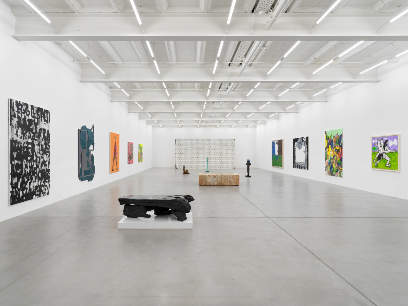 Installation view of group painting and sculpture exhibition