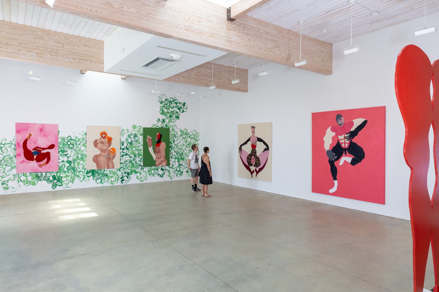 Installation view of paintings and sculptures by Tschabalala Self