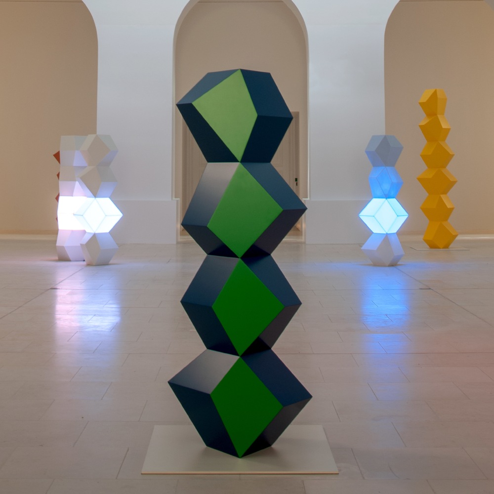 Installation view of sculptures and painting by Angela Bulloch