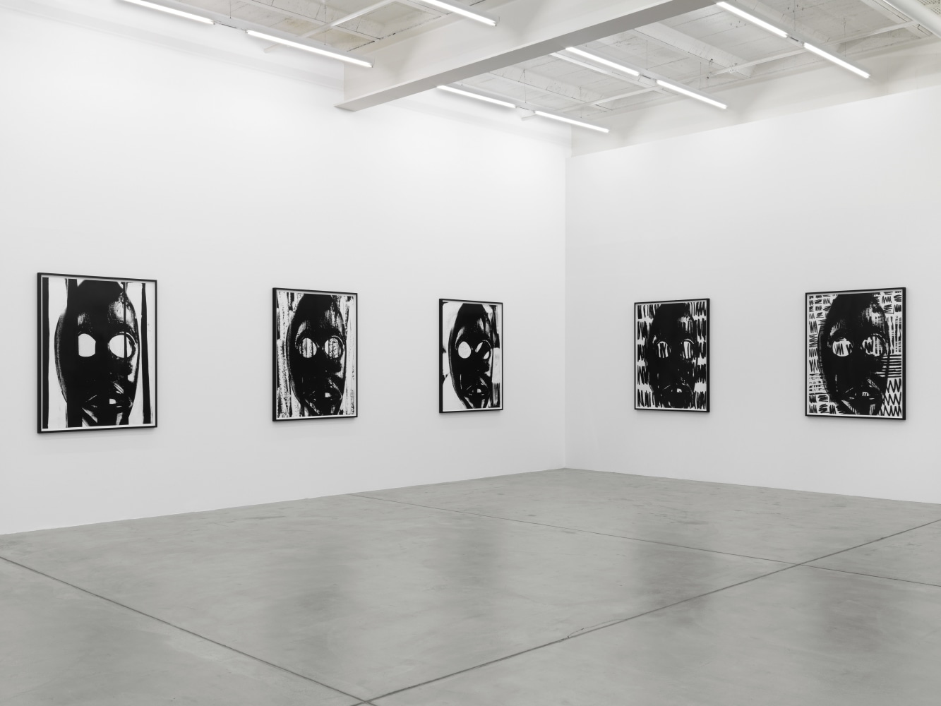 Installation view of Adam Pendleton and Pope.L wall-based works and sculptural installation