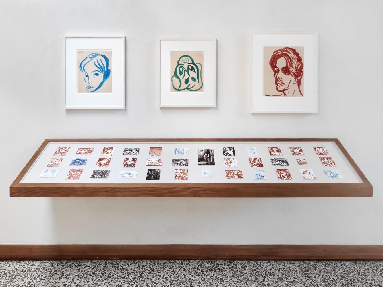 Installation view of drawings by Steven Shearer